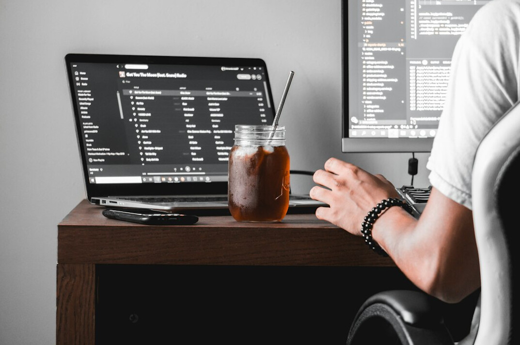 person studying coding on laptop