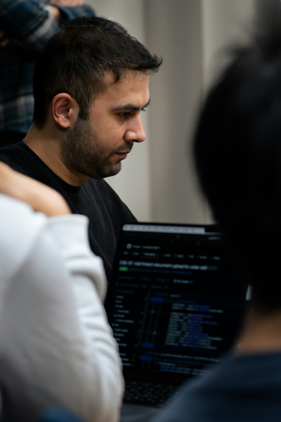 diverse group of programmers collaborating